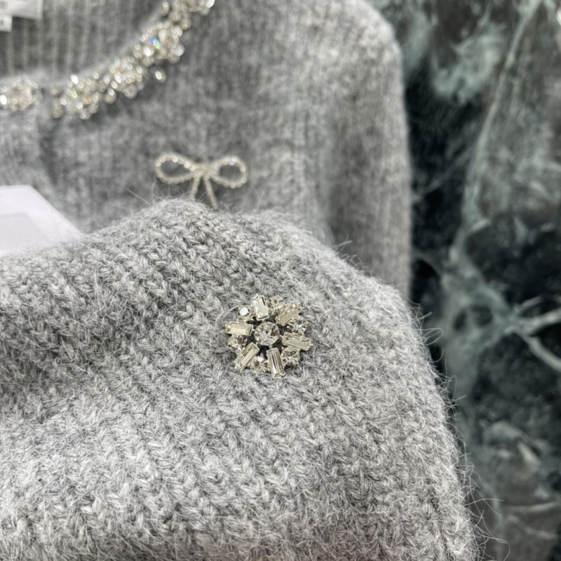 Ch**el sweaters